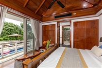 Master bedroom overlooking to the pool